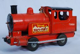 A vintage tinplate Triang Puff Puff train. 23cm x 45cm.