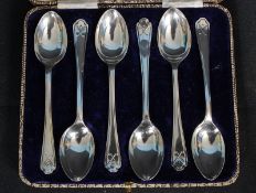 A set of 6 hallmarked cased silver spoons with Golfing crossed clubs to the handle. Hallmarked for