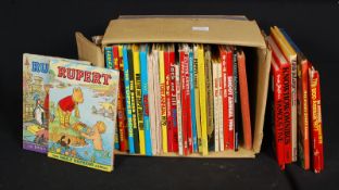 A large quantity of vintage annuals to include Hi De Hi, Rupert Bear, Dandy, Topper etc.