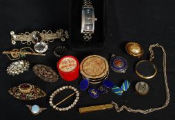 A collection of Victorian and later costume jewellery to include brooches, sterling silver medal (