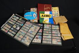 A mixed lot of stamp, loose and in ablums along with Aero stamp album and stockbooks etc