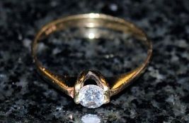 A diamond single stone 18k ring approx 50pts. Size X