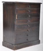 A Victorian ebonised mahogany specimin / collectors cabinet. The plinth base supporting a bank of