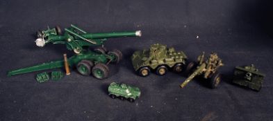 A Britains vitnage toy cannon with bullets and shells along with 3 other cap firing cannons and
