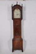 A 19th century flame mahogany inlaid longcase clock, The 12" painted arch dial signed for