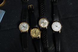 A collection of gentlemans watches to include a Roamer Sea Rock, A Delvina, Adrem and a Sekonda
