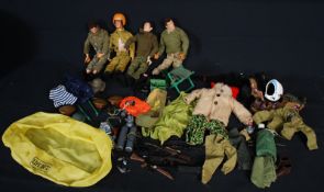 Five 1960's Action Man dolls along with a quantity of vintage clothes and accessories.