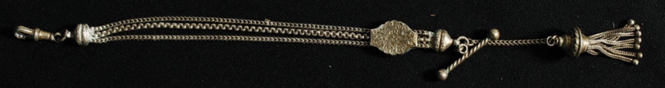 A silver white metal 3 chain chatelaine having adjustable clasp and bar. Stamped real silver to