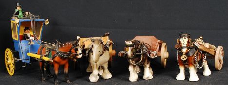 4 vintage horse and trap / cart toys made of wood. One in particular being particularly fine, some