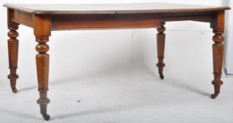 A good Victorian solid mahogany extending dining table with additional leaf. The turned and tapering