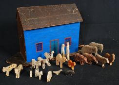 A 19th century childrens wooden toy model of Noah's Ark complete with animals in pairs etc.