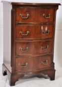 A Georgian style mahogany dwarf chest of drawers. Raised on bracket feet having a bank of 4