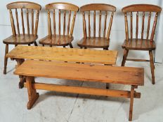 A set of 4 antique style pine kitchen dining chairs. Turned legs with solid seats and raised spindle