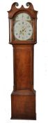 A Georgian 19th century oak inlaid longcase clock having painted face with fusee movement. The