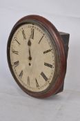 A 19th century Victorian fusee movement station clock. Set in a mahogany circular frame, open