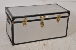 A silvered large 20th century blanket box having brass effect metal clasp locks with handles to