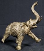 A large bronze statue of a startled elephant