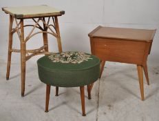 A retro Danish teak sewing  / work box together with a retro tapestry upholstered footstool and a