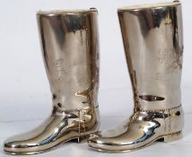 A pair of novelty silver plate drinking measures in the form of boots. Marked for Grenadier,