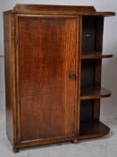 A 1930's Art Deco oak hall cabinet. The plinth base having a locker cabinet with shelves to the