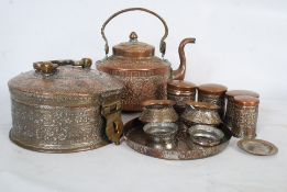 A 19th century Indian dabbawalla of decorative form being silver plated over copper complete with