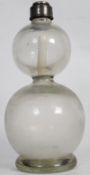 An early 20th century British Seltzogene double gourd soda syphon. The metal top bearing makers