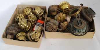 2 boxes of assorted victorian and later brass oil lamp wick fitments / centres (see illustration)
