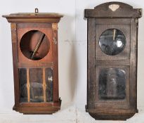 2 early 20th century large wall clock cases for parts / restoration purposes. One in oak, the