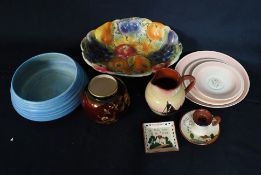 A Carlton Ware rouge royal ginger jar along with a Carlton Ware bowl and other items to include