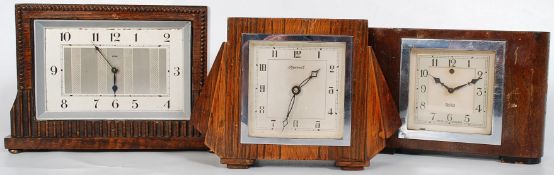 A 1930`s Art Deco oak cased Ingersoll mantle clock together with an Art Deco Smiths electric clock