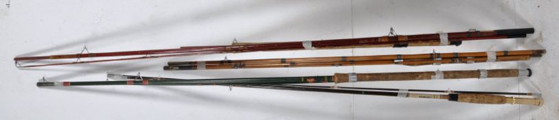 Four fishing rods to include Sealey Tudor Rose and Abu along with two others.