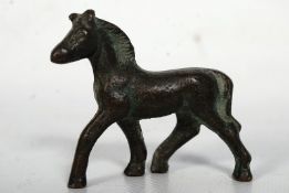 A small bronze antique hand sculptured horse figure, believed to be roman - from a residence in