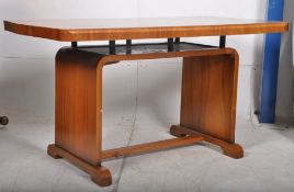 1930`s Art Deco Burr Walnut dining table in the manner of Epstein. Arched supports united by