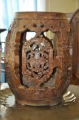 A 20th century Hardwood openwork Chinese barrel stool / planter. The cylindrical barrel form being