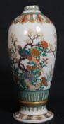 An 18th century Chinese enamel painted famille rose vase of baluster from decorated by hand with