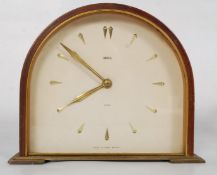A Smiths 1950`s retro 8 day floating movement balance mantle clock set in a mahogany case with