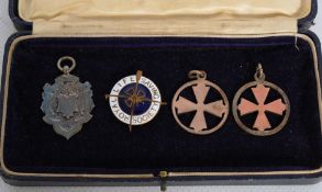 A pair of hallmarked silver masonic medallions, a hallmarked BSRU 1933 - 1934 medal and an enamel
