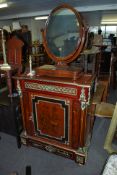 A French kingwood and gilt metal pier cabinet. Raised on turned legs with gilt metal banded