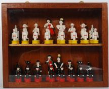 A Spanish bull fighting themed wooden toy chess set with Matador King, Bull Knight etc. In display