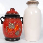 A German 1970`s Rumtopf vase with lid together with a Fat Lava West German vase having foliate