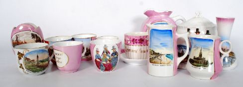 14 pieces of lustre souvenir ware.