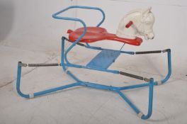 A Triang tubular metal framed retro rocking horse. H56cm x W75cm x D52cm