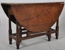 An 18th century peg jointed country oak drop leaf gate leg dining table. Circa 1790-1810, the peg