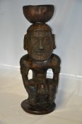 A large Maori carved wood Teko Teko statue / bust. With wide eyes and open mouth in seated