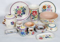 A collection of Poole pottery to include bowls, plates, vases, conserves etc.