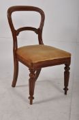 An early Victorian kidney / balloon back bedroom chair. The turned legs supporting yellow velour