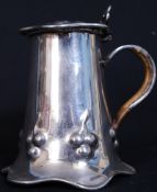 A Victorian silver plate Arts & Crafts tankard by Charles Favel of Sheffield. The shaped tankard