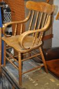 An American style bentwood Windsor chair. H90cm x W56cm x D46cm x HTS44cm.