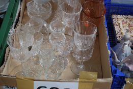 A good collection of cut glass items to include wine glasses , sherry glasses, prawn cocktail