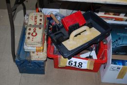 2 boxes of vintage tools, some in advertising chocolate tins etc.